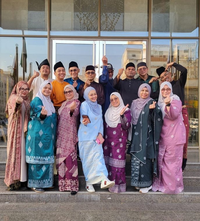 Jemaah gathered together in their finest